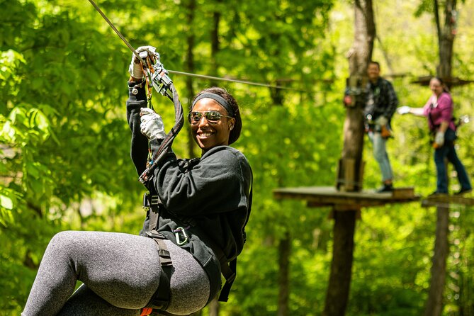 Adventure Park Ziplining and Climbing in Nashville - Daytime Fun and Evening Atmosphere