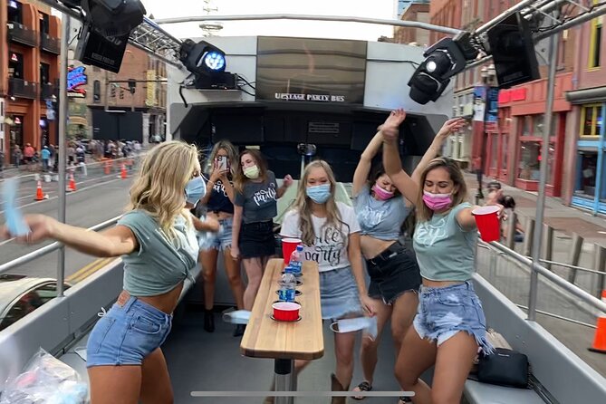 Open Air Party Bus with DJ & Bartender 21+ - Nissan Stadium and the photo stop